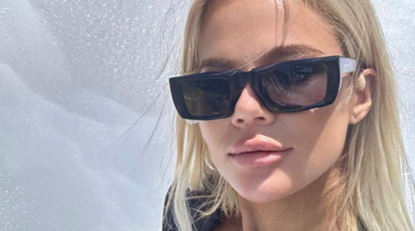 Khloé Kardashian jokingly labels herself a "lunatic" when discussing her parenting approach