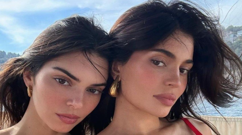 Kendall Jenner and her sister Kylie Jenner enjoy paddleboarding together in Spain